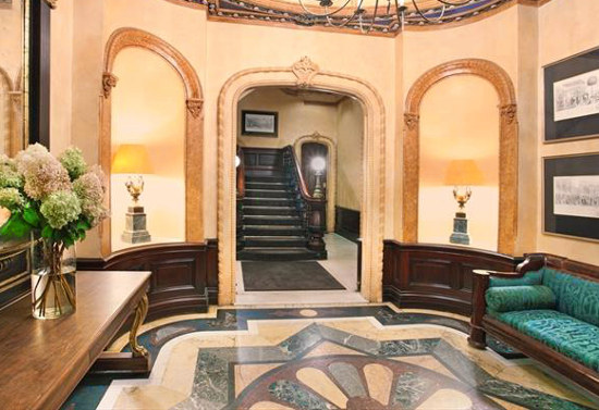 Antique Living Room with Staircase