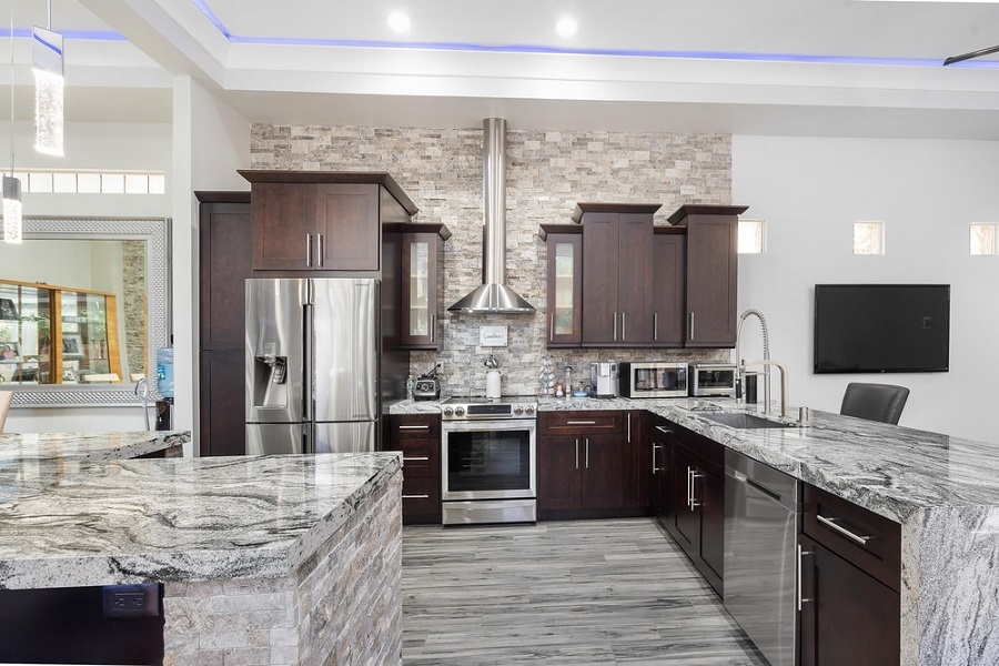 granite countertops with dark kitchen cabinets