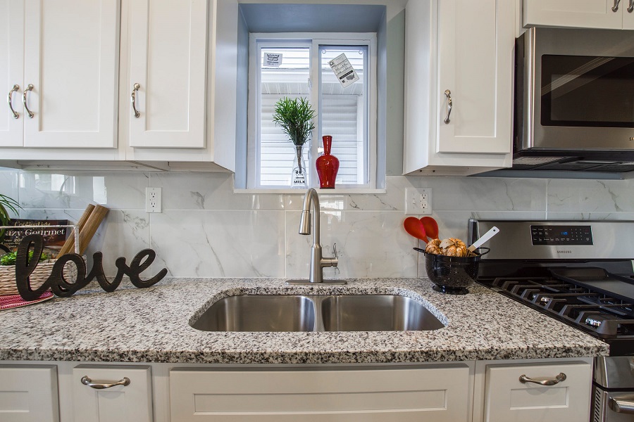 granite countertops with stainless steel hardware