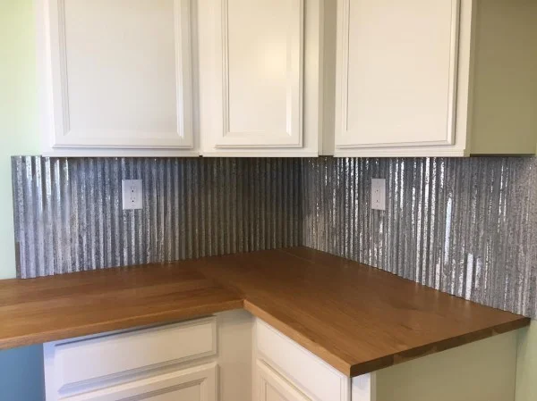 Julie on Instagram: “I'm loving this unique backsplash in my new kitchen! Can hardly wait till its all finished and we can move in. 😍 #backsplash #galvanized…”