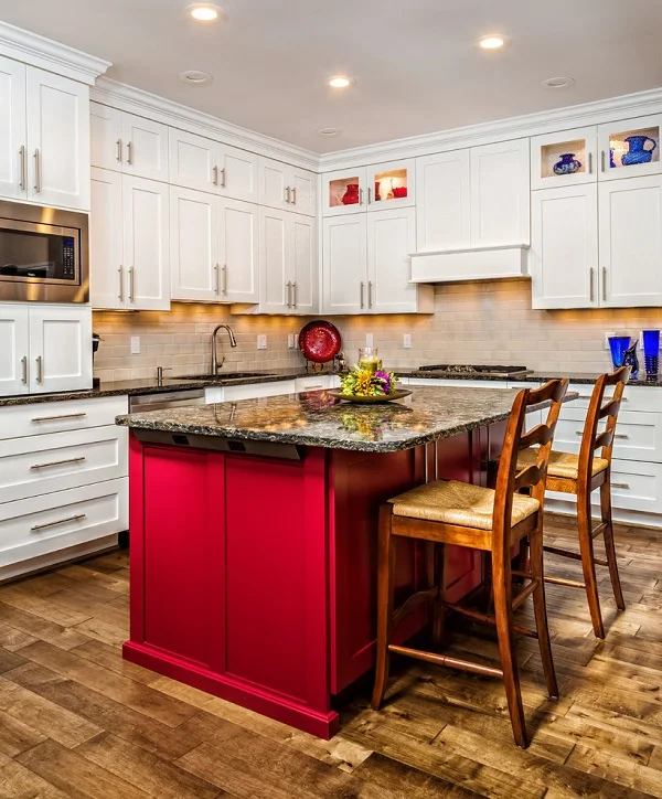 White shaker cabinets with a red kitchen island 