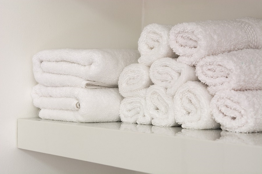 bathroom towels on shelves