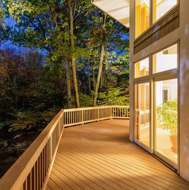 Deck on Home in Woods at Night