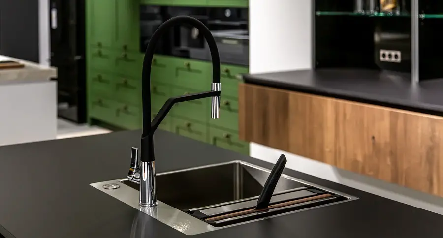 kitchen stainless steel sink and black faucet