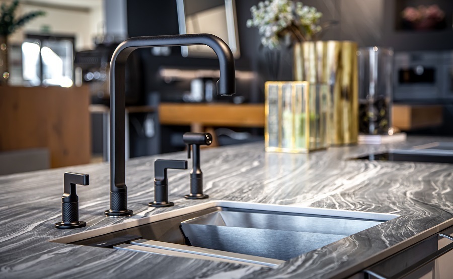 matte black kitchen faucet with steel sink