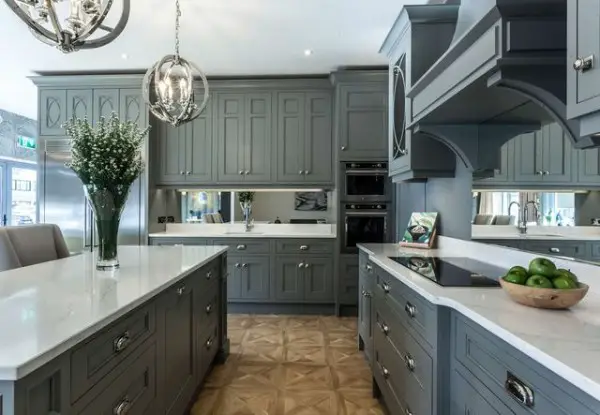 Classic In-Frame Kitchen with a Twist kitchen with mirror backsplash