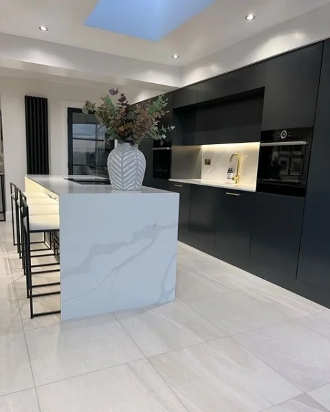 Dark and Moody Kitchen black kitchen cabinets