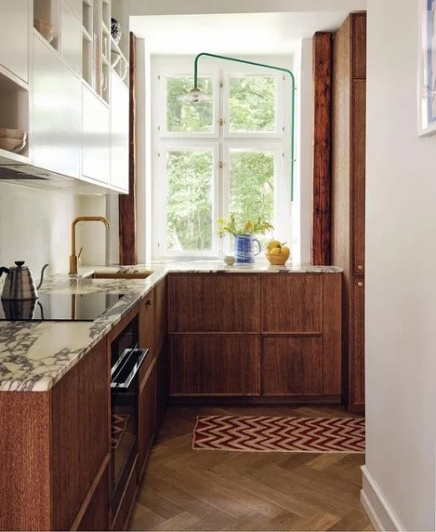 Streamlined Oak Kitchen with Calacatta Viola Marble and Angled Light oak kitchen cabinets