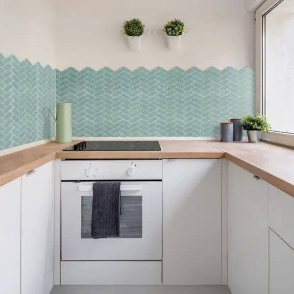Unique Design Solutions kitchen with mosaic tiles