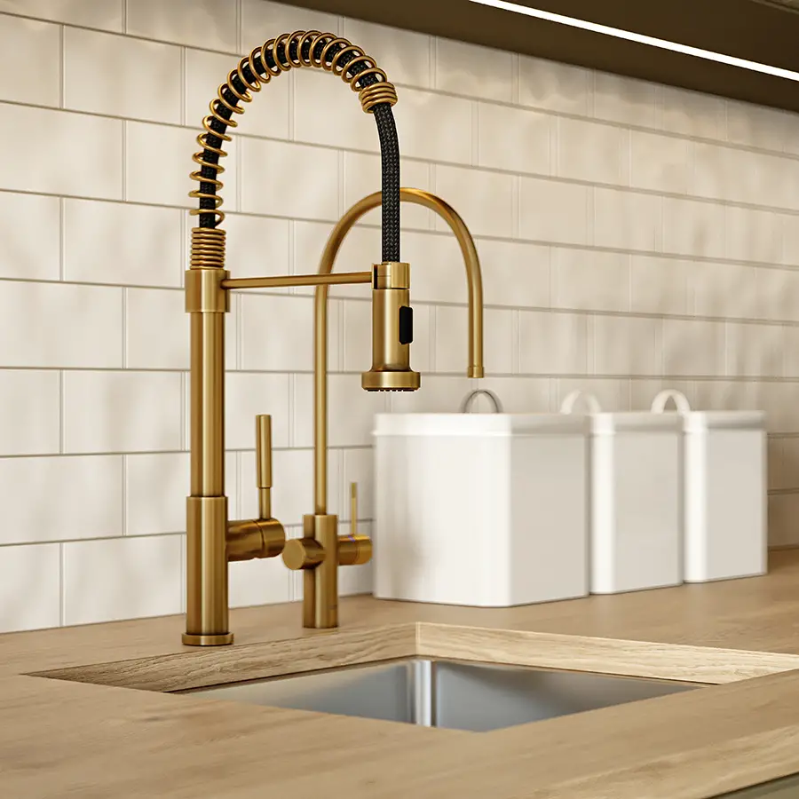 gold faucet in kitchen