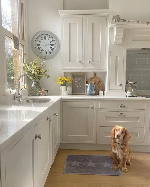 Relaxed And Cozy Shaker Kitchen With Washable Mats For Pet Owners corner kitchen