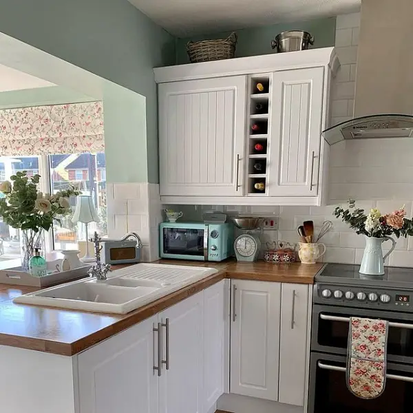Charming Modern Country Kitchen Design With Clever Corner Utilization And Pretty Pastel Accents corner kitchen