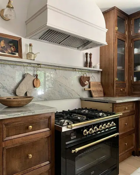 Glossy Black And Brass Range Hood With Sleek And Stunning Design kitchen range hood