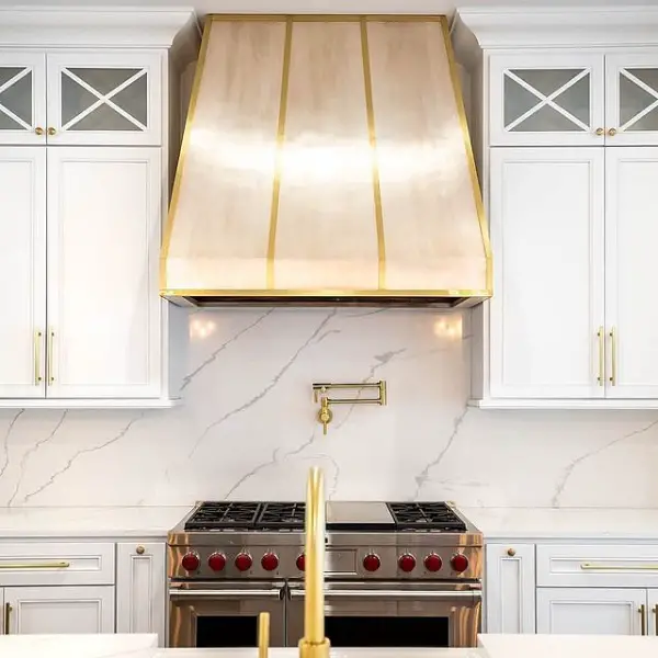 Elegant And Intricate Kitchen Range Hood Design In Burnished Nickel And Brass kitchen range hood
