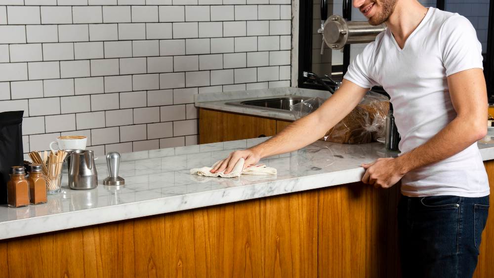 cleaning kitchen countertop