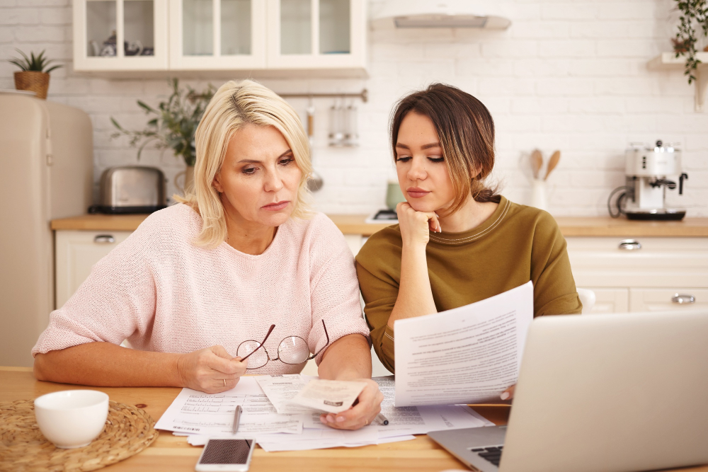 couple in kitchen thinking cost