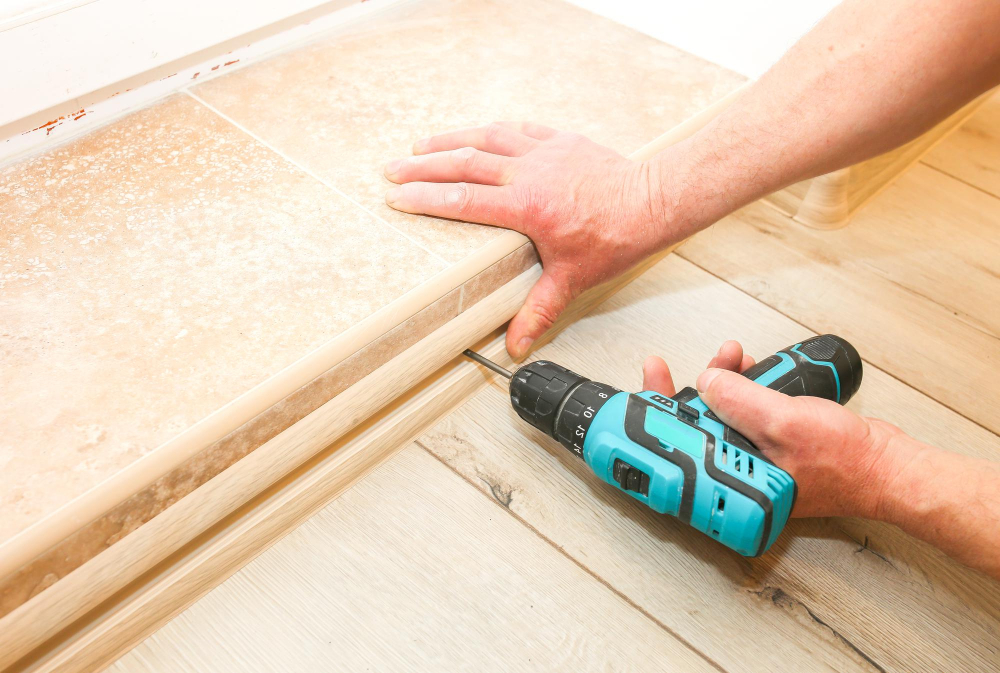 drill holes in subfloor