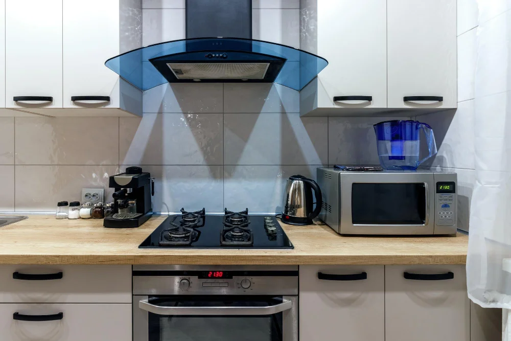 https://industrystandarddesign.com/wp-content/uploads/2023/06/kitchen-with-appliances.jpg.webp