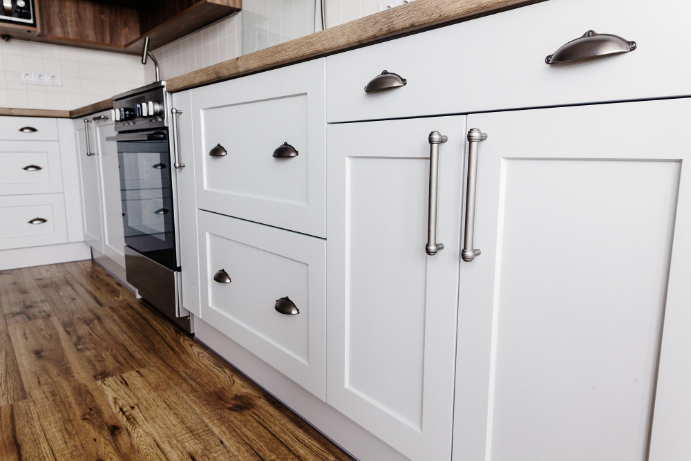 satin nickel hardware on white cabinets