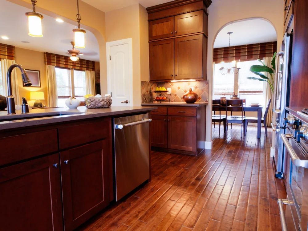 cherry cabinets kitchen with pendant lights