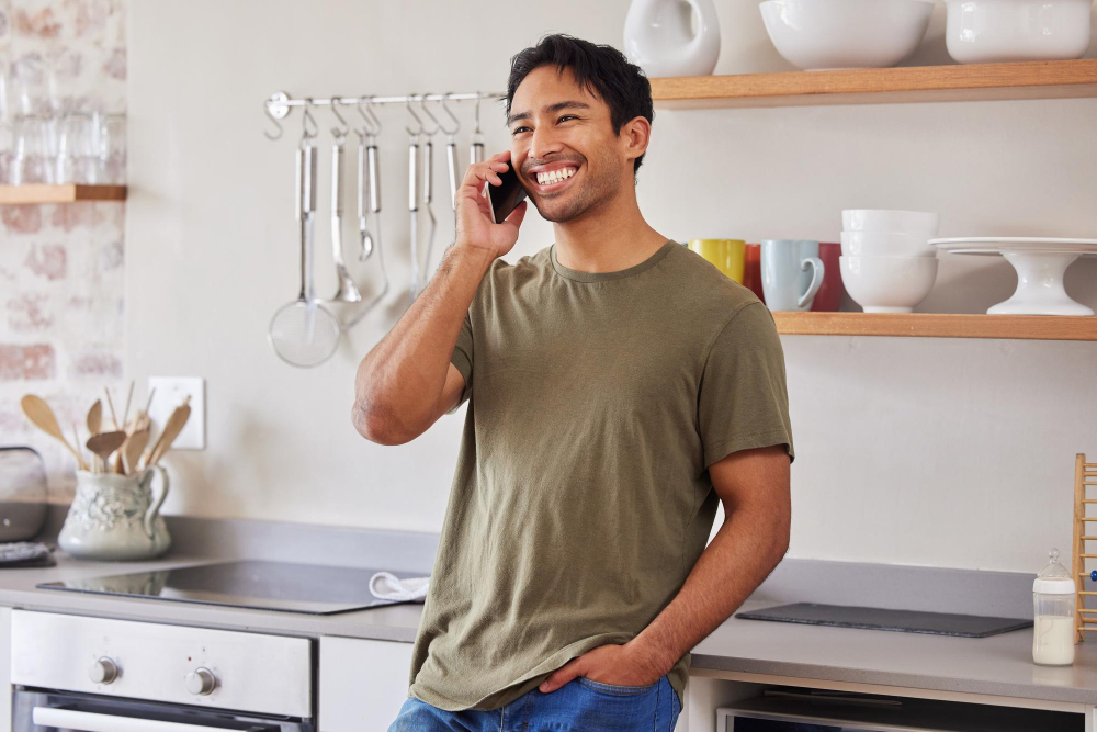 man calling in kitchen