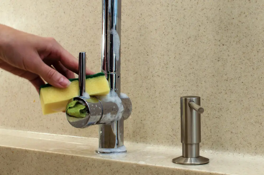 Cleaning Chrome Faucet and Soap Dispenser Kitchen Sink Sponge