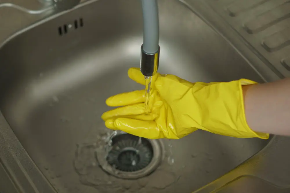 Hands to Unblock the Kitchen Sink Drain