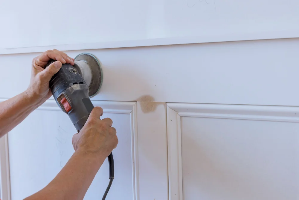 Sanding Kitchen Cabinet with Trim