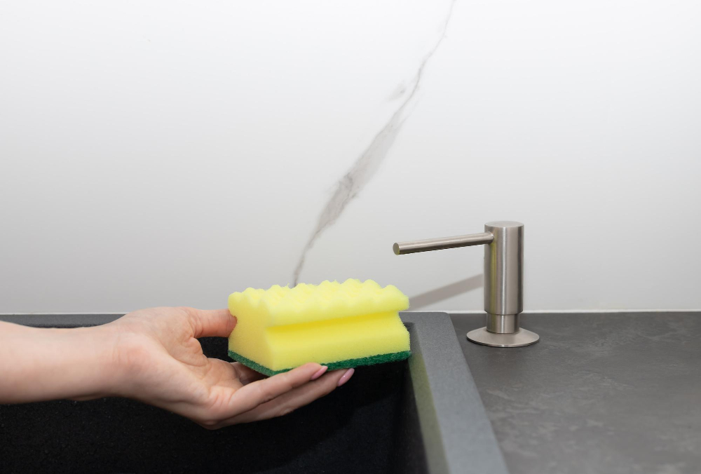 soap dispenser in kitchen sink