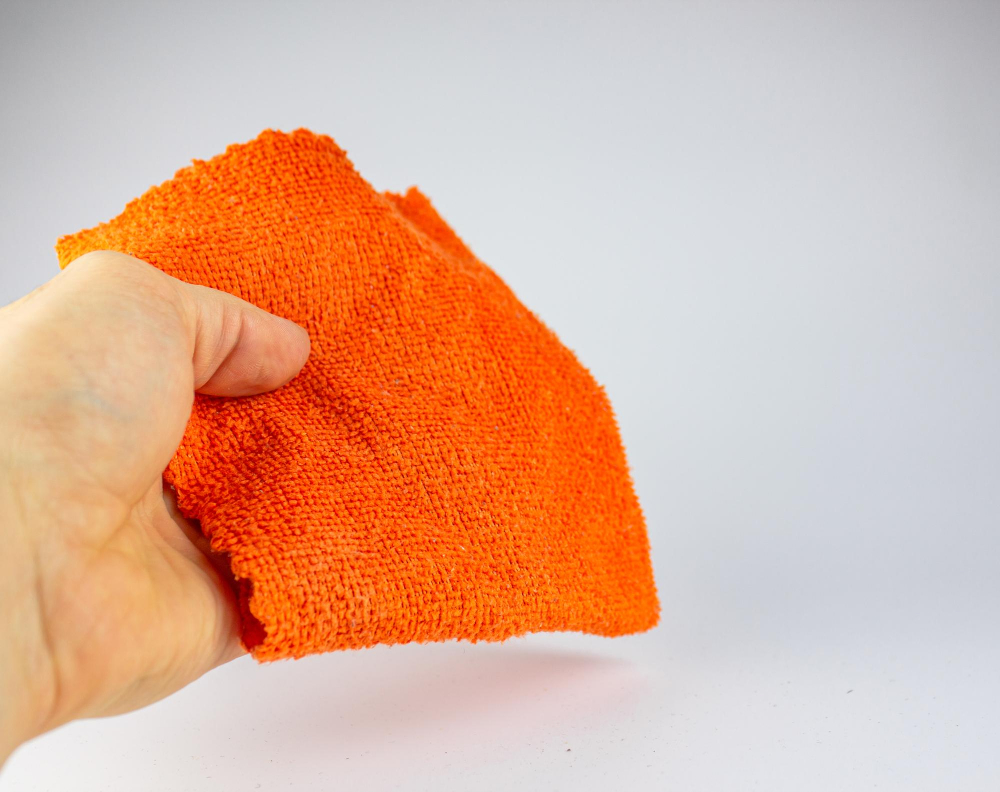 wiping with cleaning rag microfiber