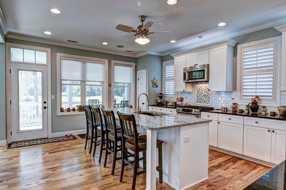 Pros and Cons Ceiling Fan with Lights in Kitchen White Recessed Cabinets