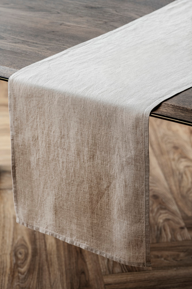 beige table runner on a wooden table kitchen