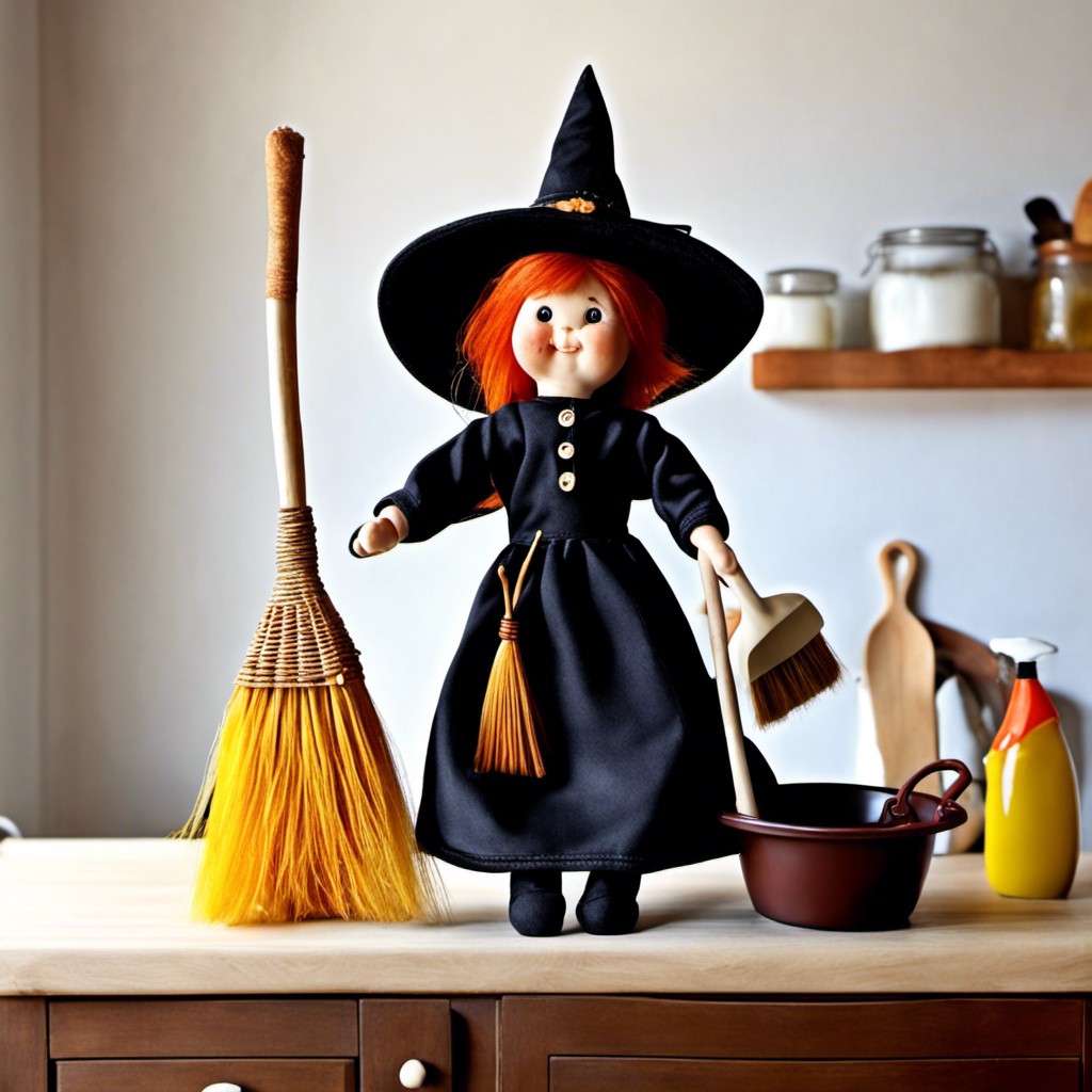 kitchen witch doll with broom and dustpan